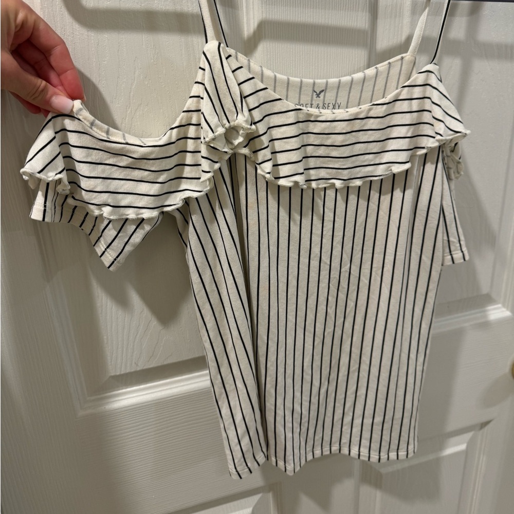American eagle striped blouse/shirt. Has spaghetti straps w/ a decorative sleeve